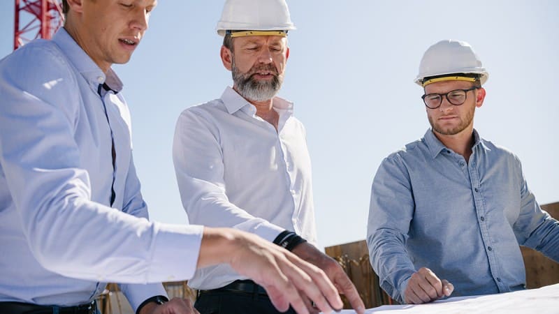 Planungsteam auf der Baustelle